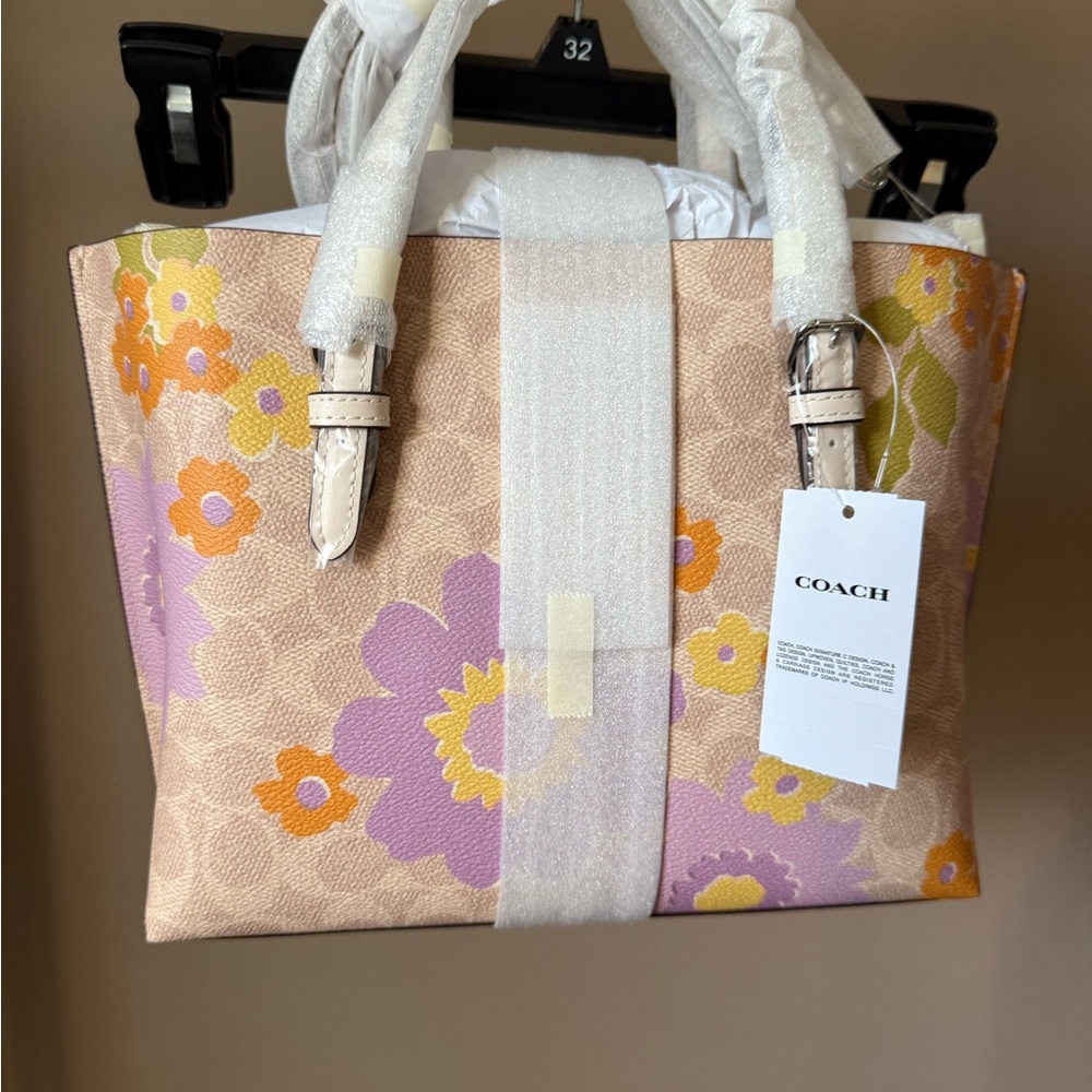 Coach Tan Tote with Purple and Yellow Floral Design